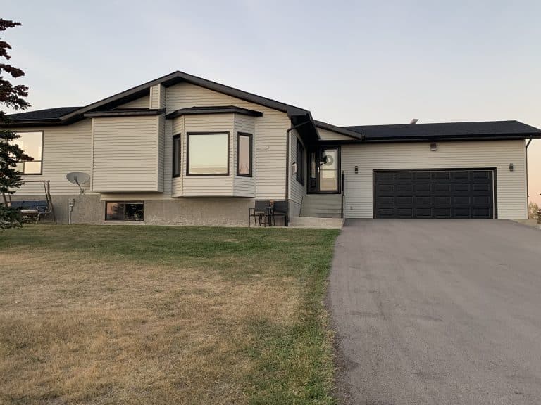 Exterior siding and trim after being painted
