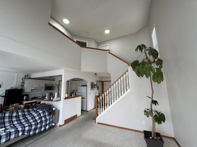Finished two-storey living room after interior painting