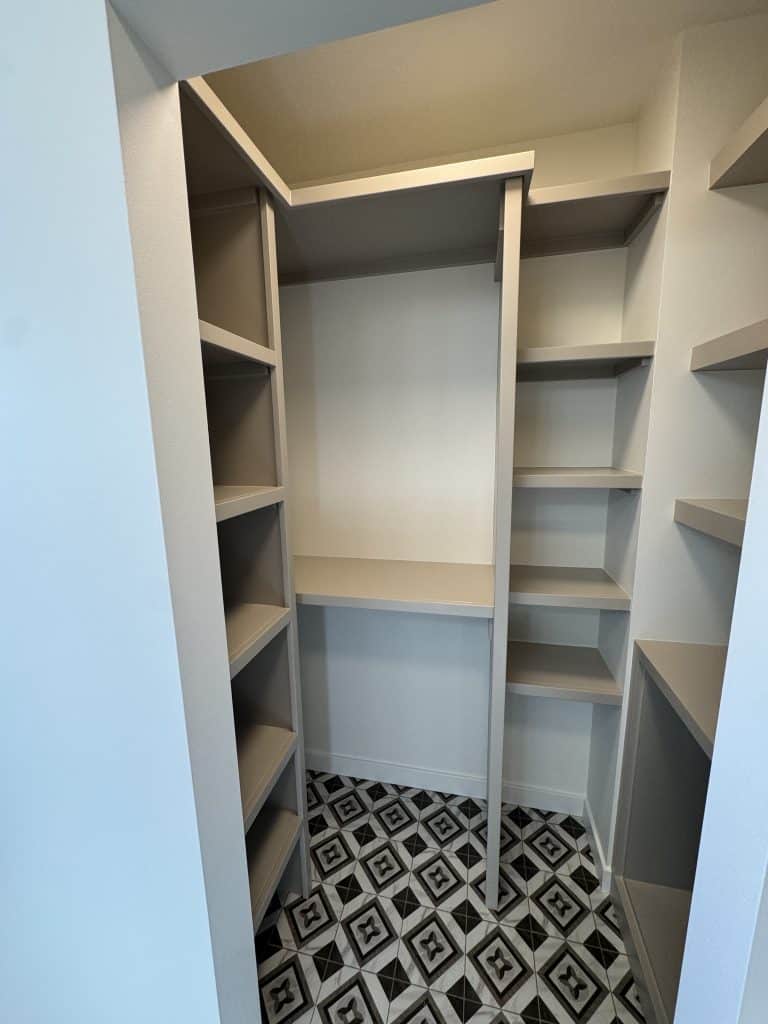 Bowness closet shelving after the completed spray finish